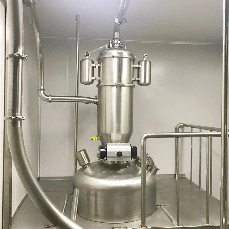Vacuum conveyor discharging into a reactor vessel in a cleanroom - view 2